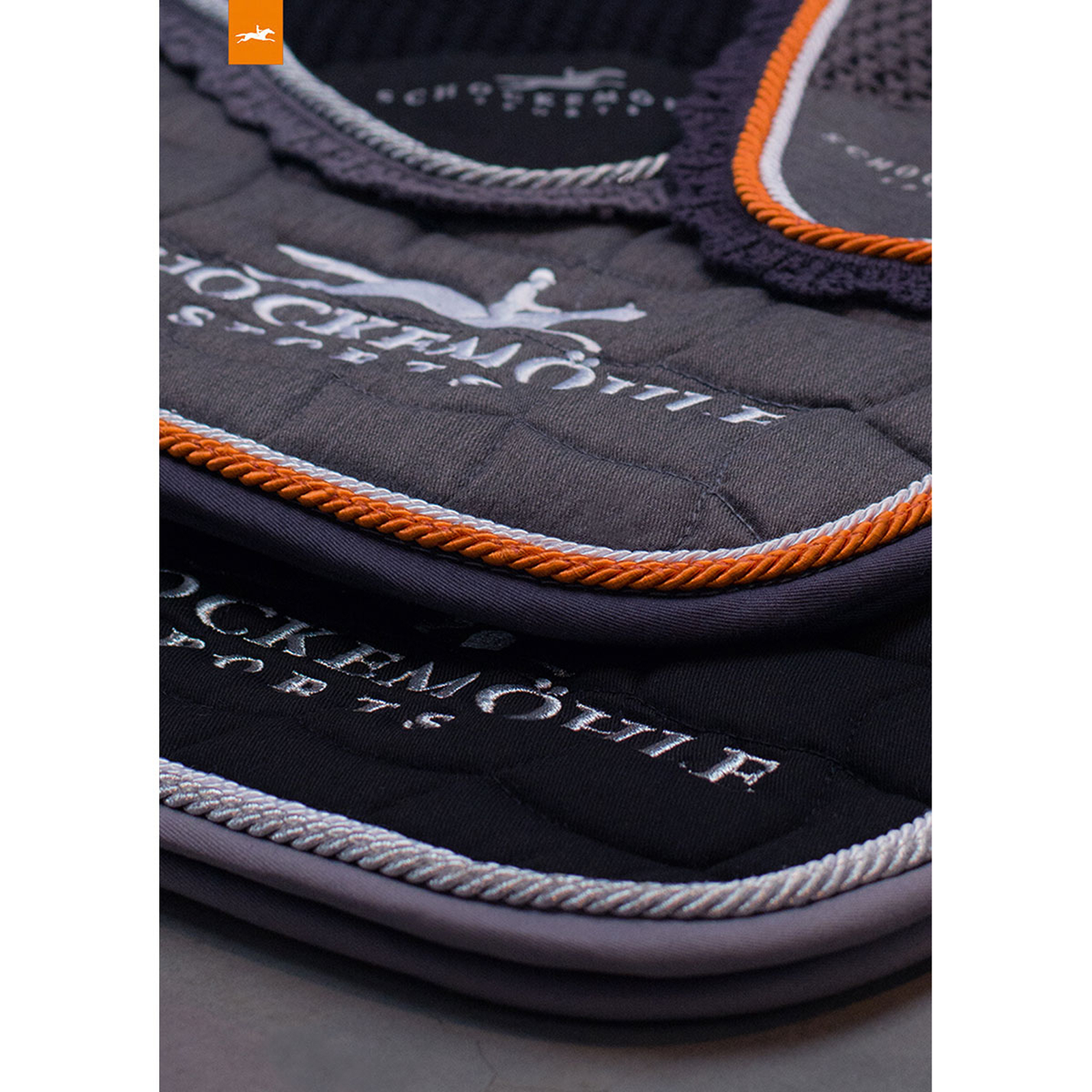 Grey Melange/Orange Schockemohle Sports Dynamite DL, koulusatulahuopa logolla