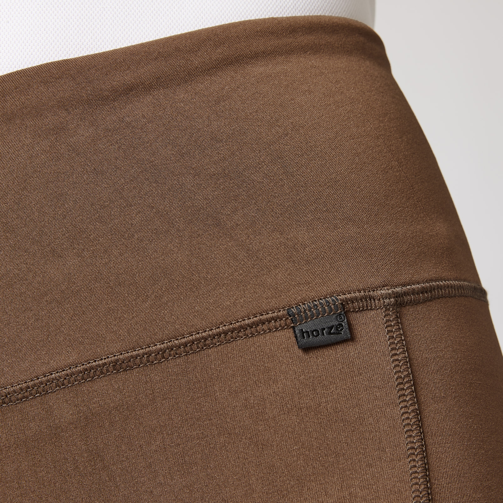 Naisten ratsastusleggingsit silikonipainatetuilla kokopaikoilla ja kännykkätaskuilla